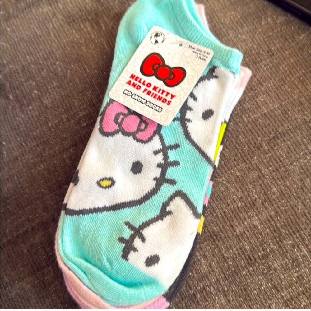 Hello Kitty Pastel No Show Socks- 3 pairs. Nice quality and great pastel colors.
